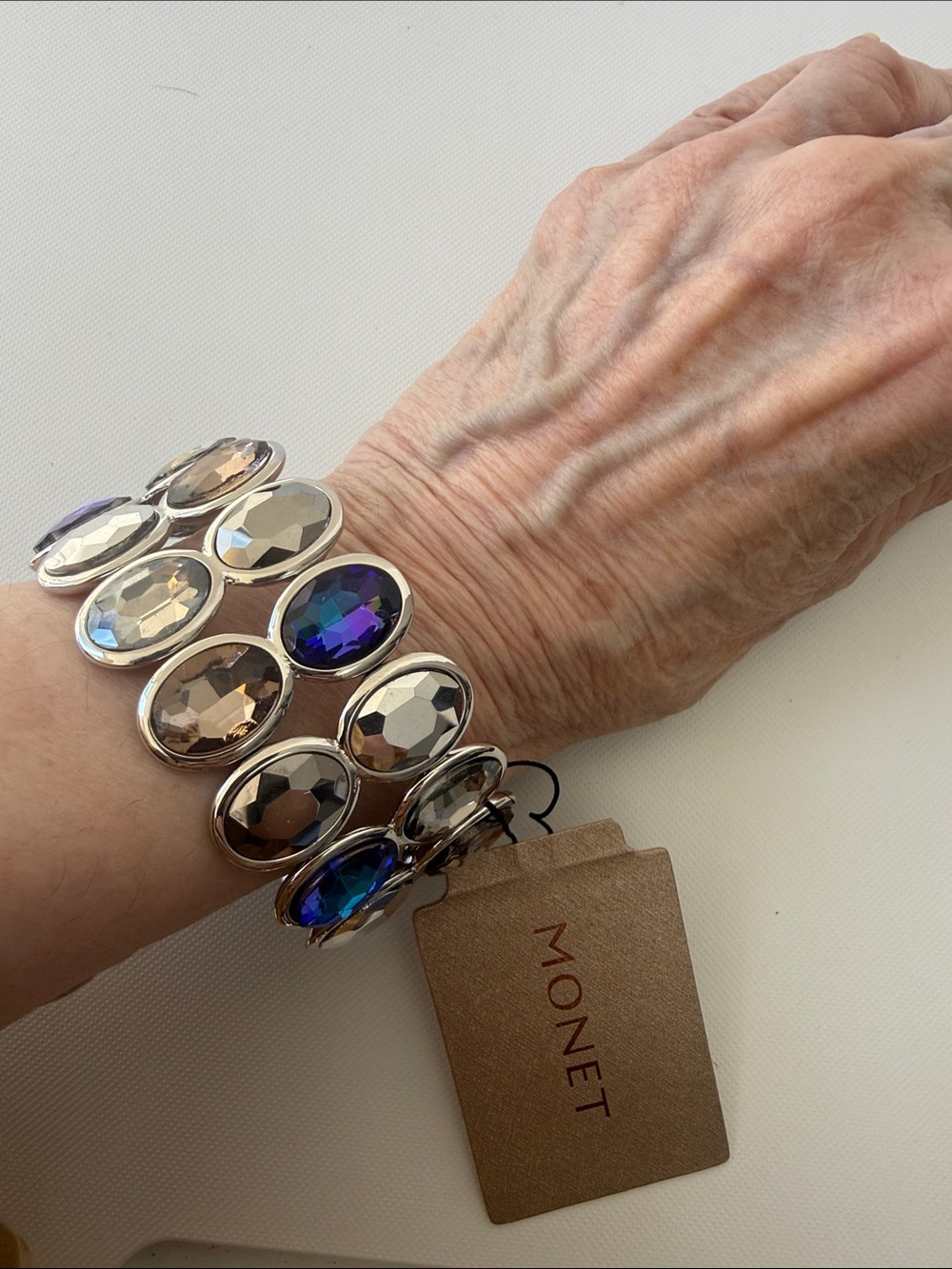 NWT Monet Fire & Ice Wide Silver Tone Stretch Bracelet with Faceted Crystals.